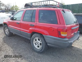 2001 Jeep Grand Cherokee Laredo with VIN 1J4GX48SX1C522670, listed as a IAAI auction lot 42111708 with Not provided miles and . Bid and sale history available at DreamBid. Image 3.