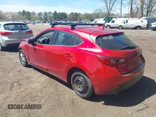 2015 Mazda 3 i Grand Touring z VIN JM1BM1M75F1269995, wystawiony jako IAAI lot #42140185 z przebiegiem 71 973 mil mil oraz . Historia ofert i sprzedaży dostępna na DreamBid. Obrazek 3.