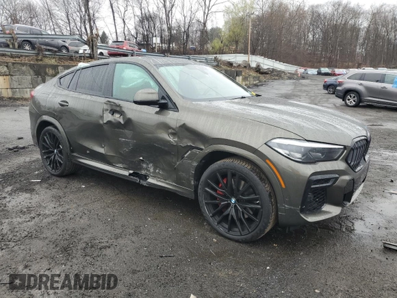 2023 BMW X6 xDrive40i z VIN 5UXCY6C03P9P48220, wystawiony jako Copart lot #51660845 z przebiegiem 24 947 mil mil oraz Szkoda całkowita • Salvage title. Historia ofert i sprzedaży dostępna na DreamBid. Obrazek 4.