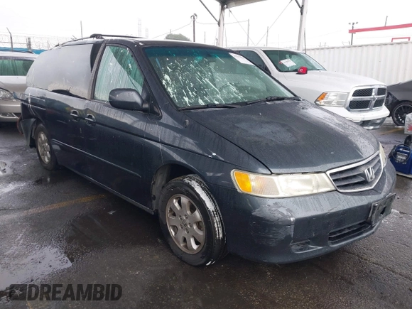 2004 Honda Odyssey EX-L with VIN 5FNRL18974B015769, listed as a IAAI auction lot 41533063 with 284,923 mi miles and . Bid and sale history available at DreamBid. Image 1.
