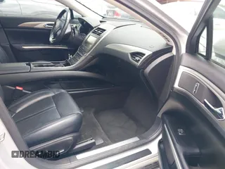 2016 Lincoln MKZ Hybrid with VIN 3LN6L2LU6GR605724, listed as a IAAI auction lot 41989432 with 154,035 mi miles. Bid and sale history available at carsss.com. Image 5.