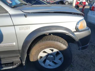 2001 Mitsubishi Montero Sport XLS with VIN JA4LS31H21P063147, listed as a IAAI auction lot 41367823 with 189,373 mi miles. Bid and sale history available at carsss.com. Image 13.
