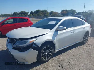 2016 Toyota Avalon Limited with VIN 4T1BK1EB1GU207322, listed as a IAAI auction lot 42030270 with 77,127 mi miles and . Bid and sale history available at carsss.com. Image 2.