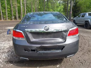 2012 Buick LaCrosse Premium 3 z VIN 1G4GH5E31CF310937, wystawiony jako IAAI lot #42092530 z przebiegiem 165 295 mil mil oraz . Historia ofert i sprzedaży dostępna na DreamBid. Obrazek 16.