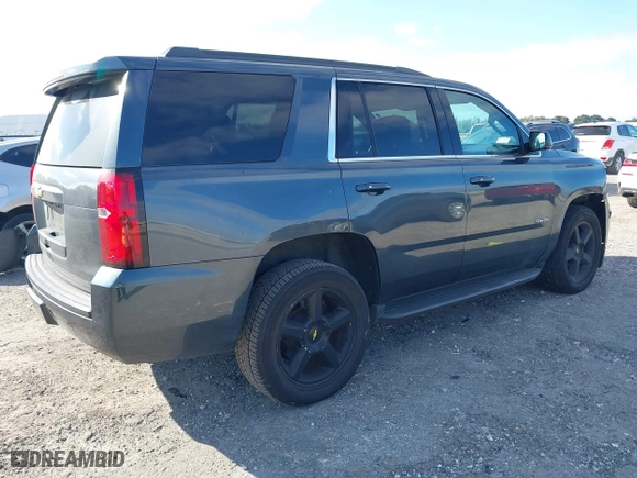 2020 Chevrolet Tahoe LT with VIN 1GNSCBKC4LR246060, listed as a IAAI auction lot 41272902 with 105,417 mi miles. Bid and sale history available at carsss.com. Image 4.