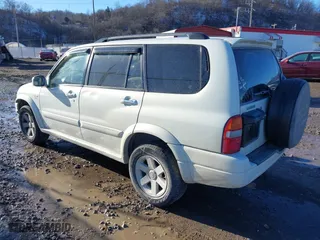 2003 Suzuki XL-7 Touring with VIN JS3TX92V734100178, listed as a IAAI auction lot 41386492 with 91,912 mi miles. Bid and sale history available at carsss.com. Image 3.