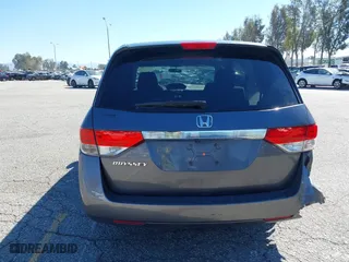 2016 Honda Odyssey LX with VIN 5FNRL5H20GB081899, listed as a IAAI auction lot 41867107 with 139,476 mi miles. Bid and sale history available at carsss.com. Image 16.