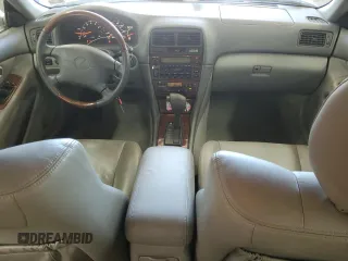 2001 Lexus ES 300 z VIN JT8BF28G910303864, wystawiony jako Copart lot #61811935 z przebiegiem 159 696 mil mil oraz Szkoda całkowita • Salvage title. Historia ofert i sprzedaży dostępna na DreamBid. Obrazek 8.