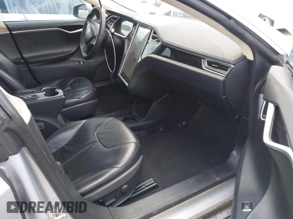 2013 Tesla Model S with VIN 5YJSA1DG7DFP11382, listed as a IAAI auction lot 42056169 with 126,975 mi miles. Bid and sale history available at carsss.com. Image 5.