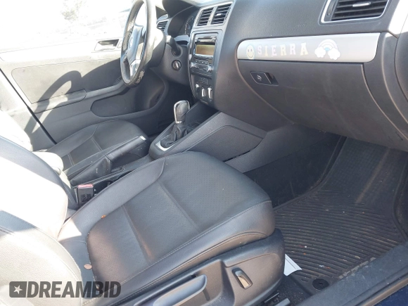 2013 Volkswagen Jetta SE with VIN 3VWDX7AJ7DM208972, listed as a IAAI auction lot 41653416 with 173,386 mi miles and . Bid and sale history available at DreamBid. Image 5.