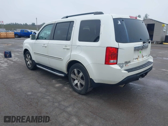 2013 Honda Pilot Touring with VIN 5FNYF4H95DB011661, listed as a IAAI auction lot 42101104 with 298,004 mi miles and . Bid and sale history available at carsss.com. Image 3.