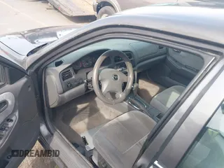 2001 Mazda 626 LX with VIN 1YVGF22C815218444, listed as a IAAI auction lot 41940404 with 143,080 mi miles. Bid and sale history available at carsss.com. Image 5.
