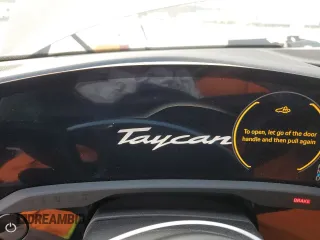 2022 Porsche Taycan z VIN WP0AA2Y10NSA13050, wystawiony jako Copart lot #82279554 z przebiegiem Nie podano mil oraz Szkoda całkowita • Salvage title. Historia ofert i sprzedaży dostępna na DreamBid. Obrazek 9.