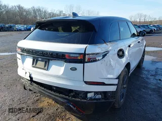 2022 Land Rover Range Rover Velar R-Dynamic S z VIN SALYT2EX7NA341627, wystawiony jako IAAI lot #41111238 z przebiegiem 18 982 mil mil oraz . Historia ofert i sprzedaży dostępna na DreamBid. Obrazek 17.