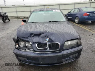 2000 BMW 3 Series 323i with VIN WBAAM3340YFP70049, listed as a Copart auction lot 58064415 with 122,574 mi miles and Clean title. Bid and sale history available at DreamBid. Image 5.