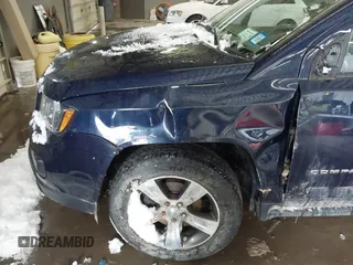 2017 Jeep Compass High Altitude with VIN 1C4NJDEB0HD176846, listed as a IAAI auction lot 41573968 with 94,123 mi miles and . Bid and sale history available at DreamBid. Image 6.