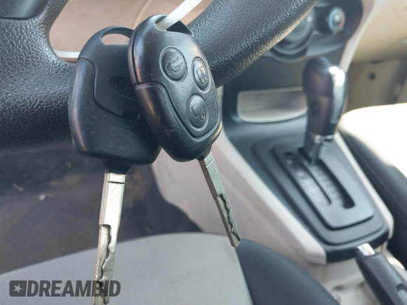 2013 Ford Fiesta S with VIN 3FADP4AJ7DM184180, listed as a IAAI auction lot 42632804 with 176,729 mi miles and . Bid and sale history available at DreamBid. Image 11.
