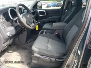2006 Honda Ridgeline RT с VIN 2HJYK16266H555935, выставлен на аукционе Copart как лот 64286345 с пробегом 198 113 миль миль и Чистый • Clean title. История ставок и продаж доступна на DreamBid. Изображение 7.