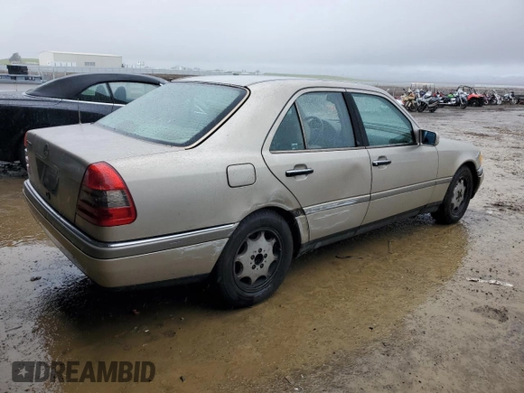 1997 Mercedes-Benz C with VIN WDBHA28E3VF530316, listed as a Copart auction lot 85938384 with 169,664 mi miles and Salvage Title. Bid and sale history available at carsss.com. Image 3.