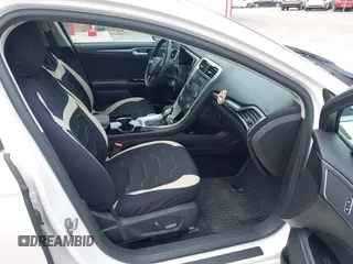 2015 Ford Fusion SE Hybrid with VIN 3FA6P0LU2FR305597, listed as a IAAI auction lot 42168292 with 97,688 mi miles and . Bid and sale history available at DreamBid. Image 5.