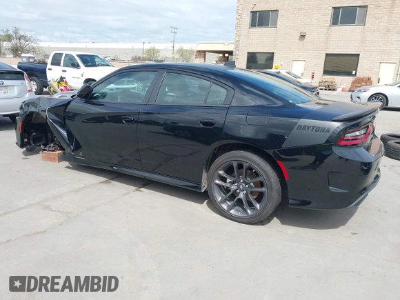 2021 Dodge Charger R/T with VIN 2C3CDXCT4MH651945, listed as a IAAI auction lot 41861896 with 25,569 mi miles and . Bid and sale history available at carsss.com. Image 3.