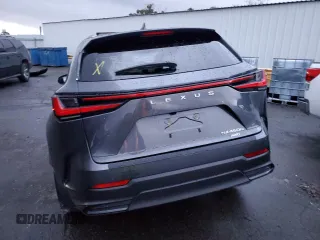 2023 Lexus NX 450h+ Luxury with VIN JTJHKCFZ0P2013668, listed as a Copart auction lot 37944734 with Not provided miles and . Bid and sale history available at DreamBid. Image 6.