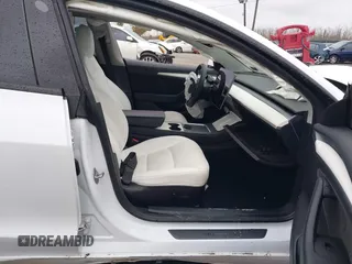 2022 Tesla Model 3 Long Range with VIN 5YJ3E1EB0NF129945, listed as a IAAI auction lot 41965531 with 59,162 mi miles and . Bid and sale history available at DreamBid. Image 5.