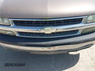 2004 Chevrolet Suburban LT with VIN 1GNEC16Z64J117498, listed as a IAAI auction lot 42005973 with 246,938 mi miles. Bid and sale history available at carsss.com. Image 6.