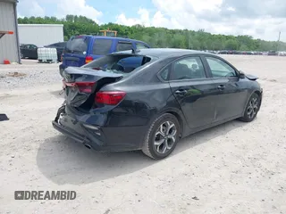 2021 Kia Forte LXS with VIN 3KPF24ADXME297496, listed as a IAAI auction lot 42274152 with 80,345 mi miles and . Bid and sale history available at DreamBid. Image 4.