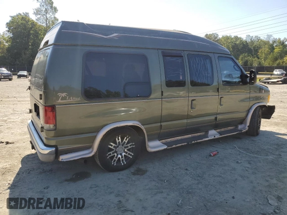 2002 Ford Econoline Cargo with VIN 1FDRE14W62HB15506, listed as a Copart auction lot 74686494 with 253,296 mi miles and Salvage Title. Bid and sale history available at DreamBid. Image 3.