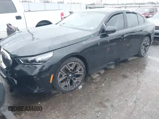 2024 BMW 5 Series 530i with VIN WBA43FJ0XRCS17347, listed as a IAAI auction lot 41279069 with 4,768 mi miles. Bid and sale history available at carsss.com. Image 2.