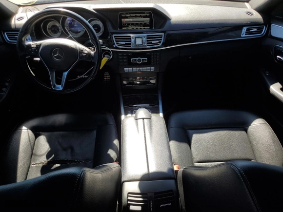2015 Mercedes-Benz E-Class E 250 BlueTEC Luxury with VIN WDDHF0EB0FB149099, listed as a Copart auction lot 73056304 with 99,434 mi miles and Salvage Title. Bid and sale history available at carsss.com. Image 8.