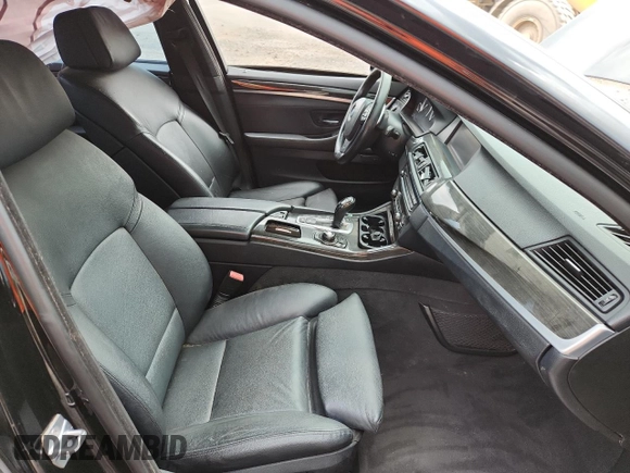 2013 BMW 5 Series 550i xDrive with VIN WBAFU9C55DDY72065, listed as a Copart auction lot 63023675 with 117,592 mi miles and Salvage title. Bid and sale history available at DreamBid. Image 7.