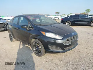2018 Ford Fiesta SE z VIN 3FADP4BJXJM117051, wystawiony jako IAAI lot #42049956 z przebiegiem 27 367 mil mil oraz . Historia ofert i sprzedaży dostępna na DreamBid. Obrazek 1.