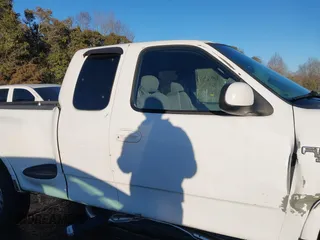 2003 Ford F-150 z VIN 2FTRX08W63CA22223, wystawiony jako IAAI lot #41382377 z przebiegiem 261 841 mil mil oraz . Historia ofert i sprzedaży dostępna na DreamBid. Obrazek 13.