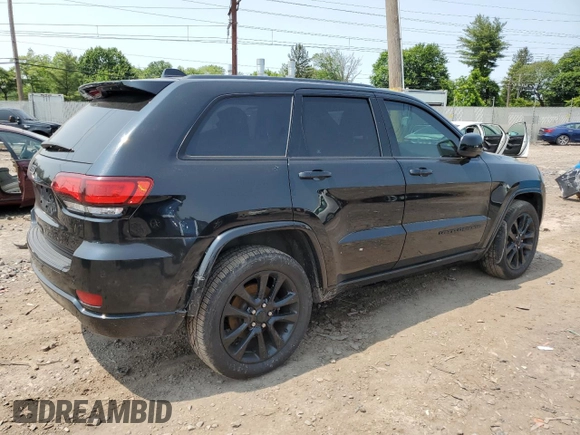 2017 Jeep Grand Cherokee Altitude with VIN 1C4RJFAG5HC892291, listed as a Copart auction lot 58579975 with 71,018 mi miles and Salvage title. Bid and sale history available at DreamBid. Image 3.