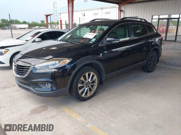 2014 Mazda CX-9 Grand Touring z VIN JM3TB2DA3E0439407, wystawiony jako IAAI lot #42332095 z przebiegiem 108 333 mil mil oraz . Historia ofert i sprzedaży dostępna na DreamBid. Obrazek 2.