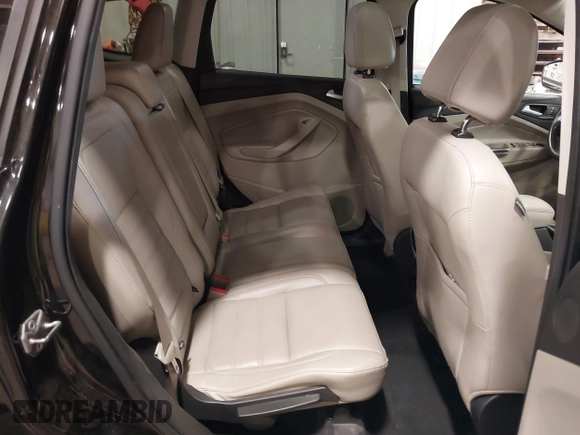 2017 Ford Escape SE with VIN 1FMCU9G98HUD67920, listed as a IAAI auction lot 40937291 with 124,302 mi miles. Bid and sale history available at carsss.com. Image 8.