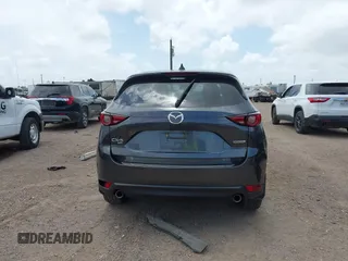 2021 Mazda CX-5 Grand Touring with VIN JM3KFBDM2M0431484, listed as a IAAI auction lot 42547665 with 34,757 mi miles and . Bid and sale history available at DreamBid. Image 17.