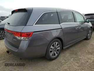 2014 Honda Odyssey Touring с VIN 5FNRL5H98EB029561, выставлен на аукционе Copart как лот 57349265 с пробегом 136 233 миль миль и Списание • Salvage title. История ставок и продаж доступна на DreamBid. Изображение 3.