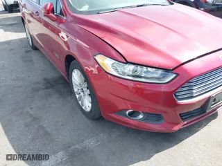 2014 Ford Fusion Energi SE Luxury with VIN 3FA6P0PUXER234528, listed as a IAAI auction lot 41644935 with 151,059 mi miles. Bid and sale history available at carsss.com. Image 6.