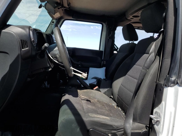 2012 Jeep Wrangler Sport с VIN 1C4AJWAG0CL219303, выставлен на аукционе Copart как лот 55102115 с пробегом 104 003 миль миль и Списание • Salvage title. История ставок и продаж доступна на DreamBid. Изображение 7.