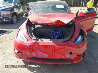 2023 Tesla Model Y Performance with VIN 7SAYGDEF6PF870935, listed as a IAAI auction lot 40718563 with 15,286 mi miles and . Bid and sale history available at DreamBid. Image 6.