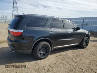 2013 Dodge Durango Crew z VIN 1C4SDJDT2DC637855, wystawiony jako Copart lot #52142195 z przebiegiem 183 244 mil mil oraz Czysty tytuł • Clean title. Historia ofert i sprzedaży dostępna na DreamBid. Obrazek 3.