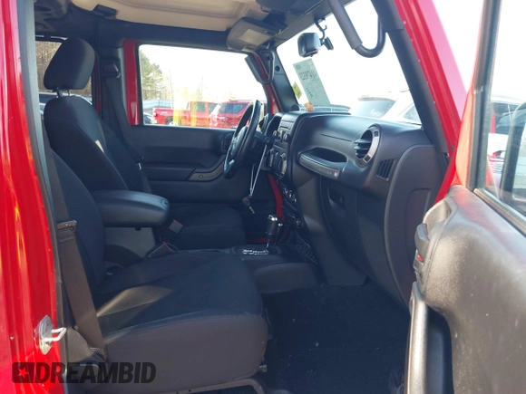 2014 Jeep Wrangler Unlimited Sport with VIN 1C4BJWDG2EL126480, listed as a IAAI auction lot 41479323 with 93,192 mi miles. Bid and sale history available at carsss.com. Image 5.