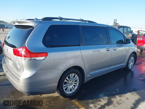 2012 Toyota Sienna XLE AAS with VIN 5TDYK3DC0CS243912, listed as a IAAI auction lot 41758833 with 132,008 mi miles and . Bid and sale history available at DreamBid. Image 4.