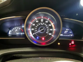 2016 Mazda 3 i Touring z VIN JM1BM1V73G1348484, wystawiony jako Copart lot #60684625 z przebiegiem 58 770 mil mil oraz Szkoda całkowita • Salvage title. Historia ofert i sprzedaży dostępna na DreamBid. Obrazek 9.