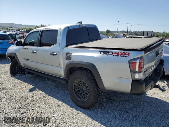 2023 Toyota Tacoma SR with VIN 3TMCZ5AN8PM545588, listed as a Copart auction lot 57528655 with 73,286 mi miles and Salvage title. Bid and sale history available at DreamBid. Image 2.
