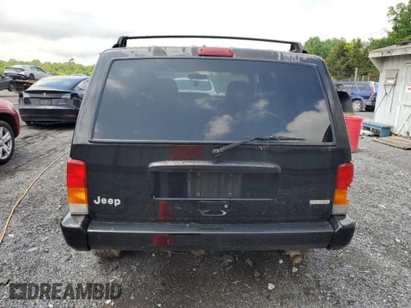 2000 Jeep Cherokee Classic with VIN 1J4FF58S8YL119611, listed as a Copart auction lot 57255685 with 148,908 mi miles and Clean title. Bid and sale history available at DreamBid. Image 6.
