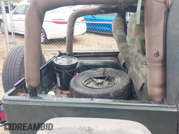 2004 Jeep Wrangler X z VIN 1J4FA39S84P714902, wystawiony jako IAAI lot #42011039 z przebiegiem Nie podano mil oraz . Historia ofert i sprzedaży dostępna na DreamBid. Obrazek 8.